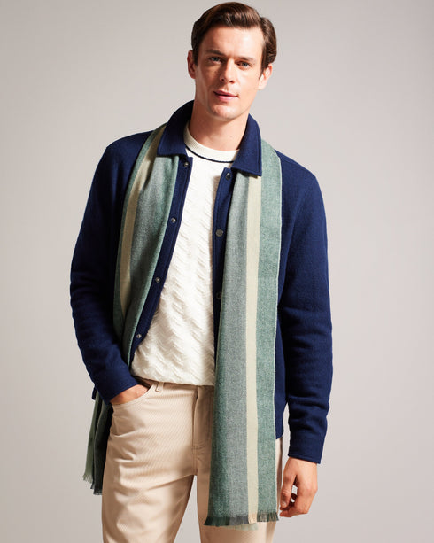ALFREDY-Scarves-ALFREDY keeps you cosy with ease. This wardrobe staple is ready for action, whether you're jetting off for a weekend away or heading to the office. A striped design means its sure to look cool whatever the weather, and its woven knit is perfect for whipping round your shoulders when the wind picks up.The fabric of this product is made with 65% recycled polyester. Using recycled polyester helps divert plastic waste from ending in landfills. Scarf Woven knit Striped Fringed edge Ted Baker bran